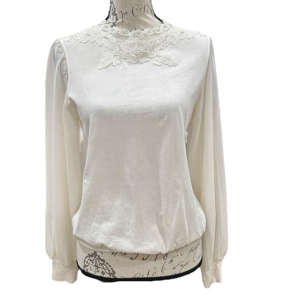 Anthropologie Tiny Long-Sleeve
Mock-Neck Lace Embellished Top - Picture 1 of 9